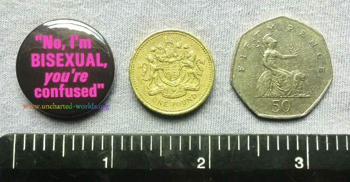 Photo of badges. All designs copyright © Jennifer Moore 1998 - 2016.